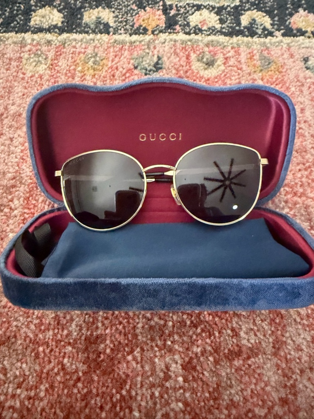Gucci Gold Frame Sunglasses with Black Lenses